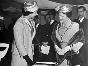 A royal visit by the Queen to Halesowen in April 1957, where she was pictured chatting to Mayoress of Halesowen Mrs J R Poots (CHECKING NAME), after presenting her with doll's pram – made by Badham Brothers – for Princess Anne. For Prince Charles there was a stainless steel miniature garden spade and fork.
