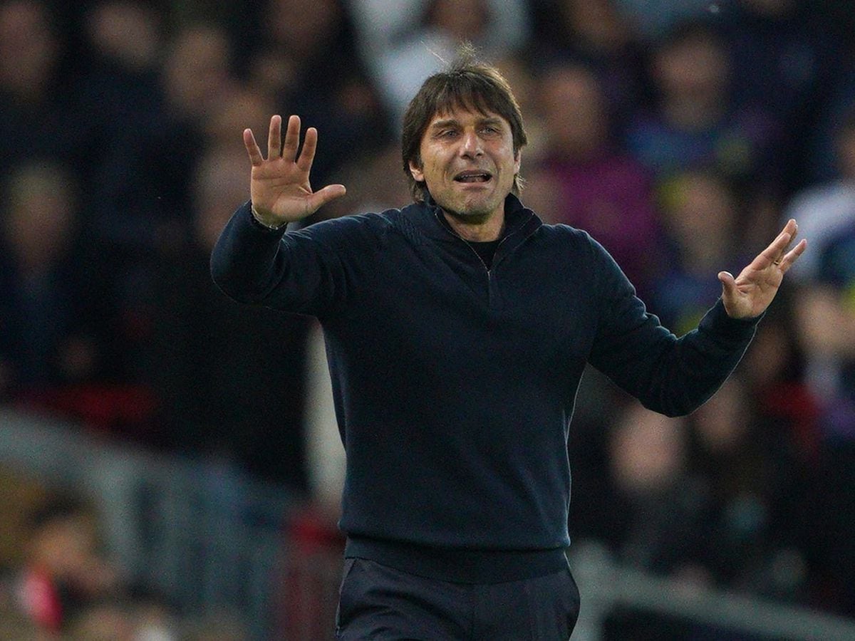 Antonio Conte insists he is "100 per cent and more" committed to Tottenham