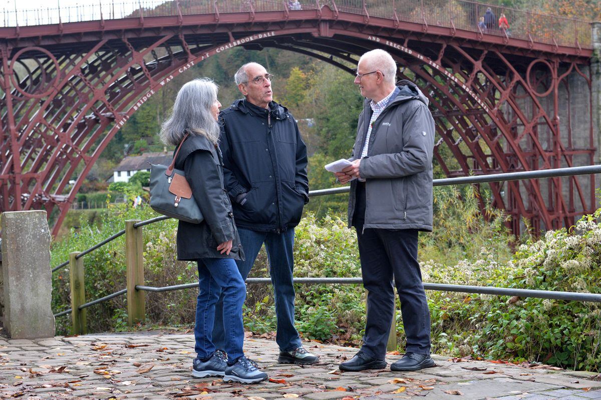Shropshire Star reporter David Tooley, right, chats with visitors to Ironbridge Ken and Ilene Epstein 