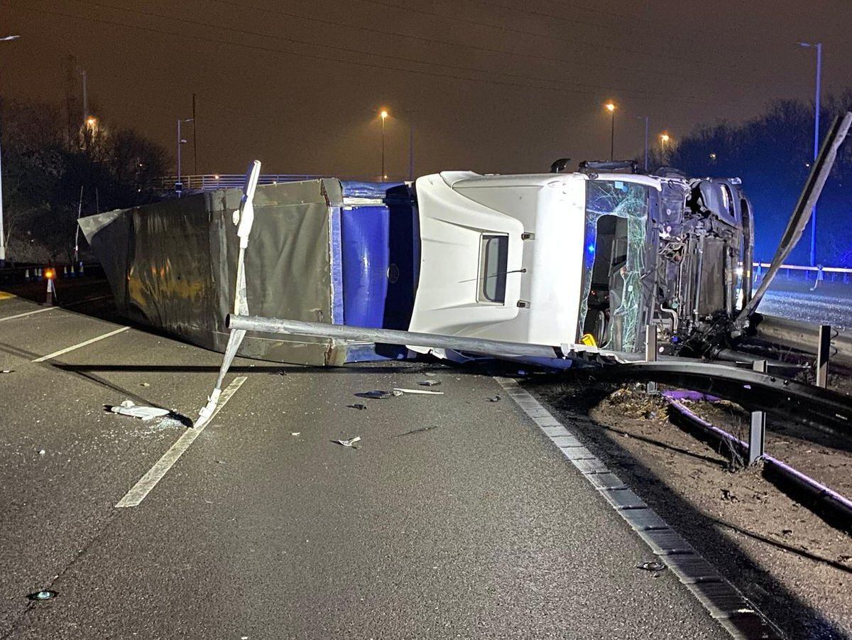 The lorry overturned following a crash with a car at Junction 10