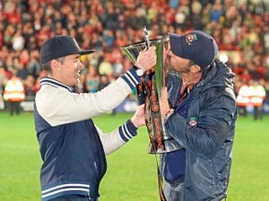 Owners Rob McElhenney and Ryan Reynolds toast National League success at Wrexham’s Racecourse Ground                         