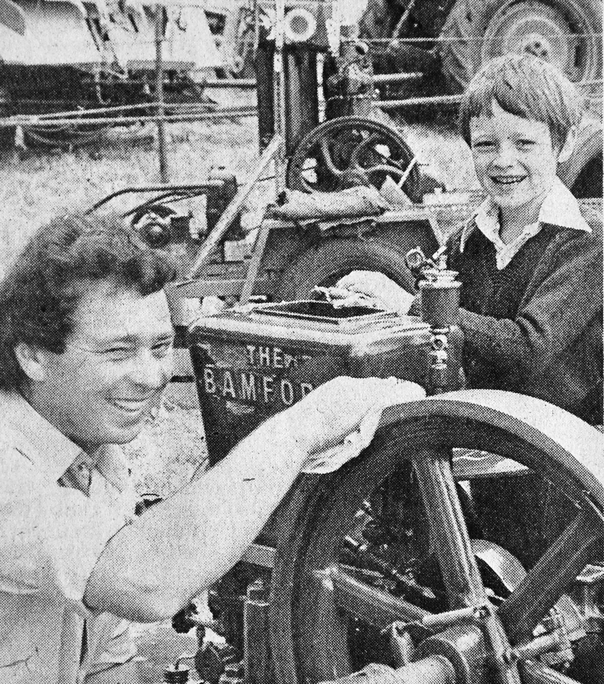 Mr Brian Redman, of Stanton Lacy, with his son Stuart, putting a shine on their Bamford oil engine at the Burwarton Show in August, 1976