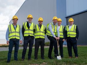 Director Glyn Jones (centre) leads the groundbreaking with fellow directors Dr David Jones, Adrian Ellam, Samir Guergueb (Facilities Manager), Rhydian Welson, and Shaun Dean, CEO of Invertek Drives and PTC EMEIA, and Senior Vice President of SHI.