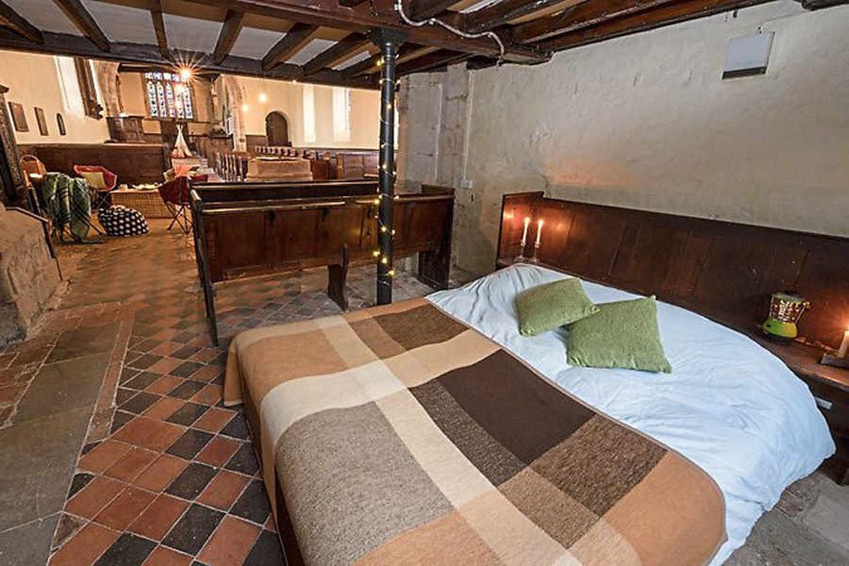 Champing in Shropshire: Stay in room with a pew at church hotel