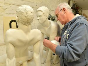  Sculptor Jas Davidson from Oswestry with one of his pieces of art