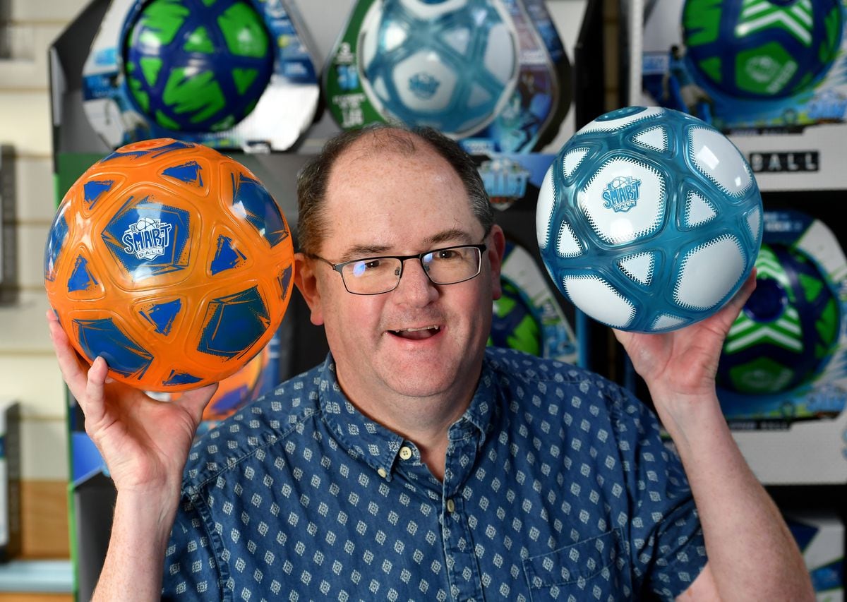 MD Barry Hughes with some of the hi-tech footballs 