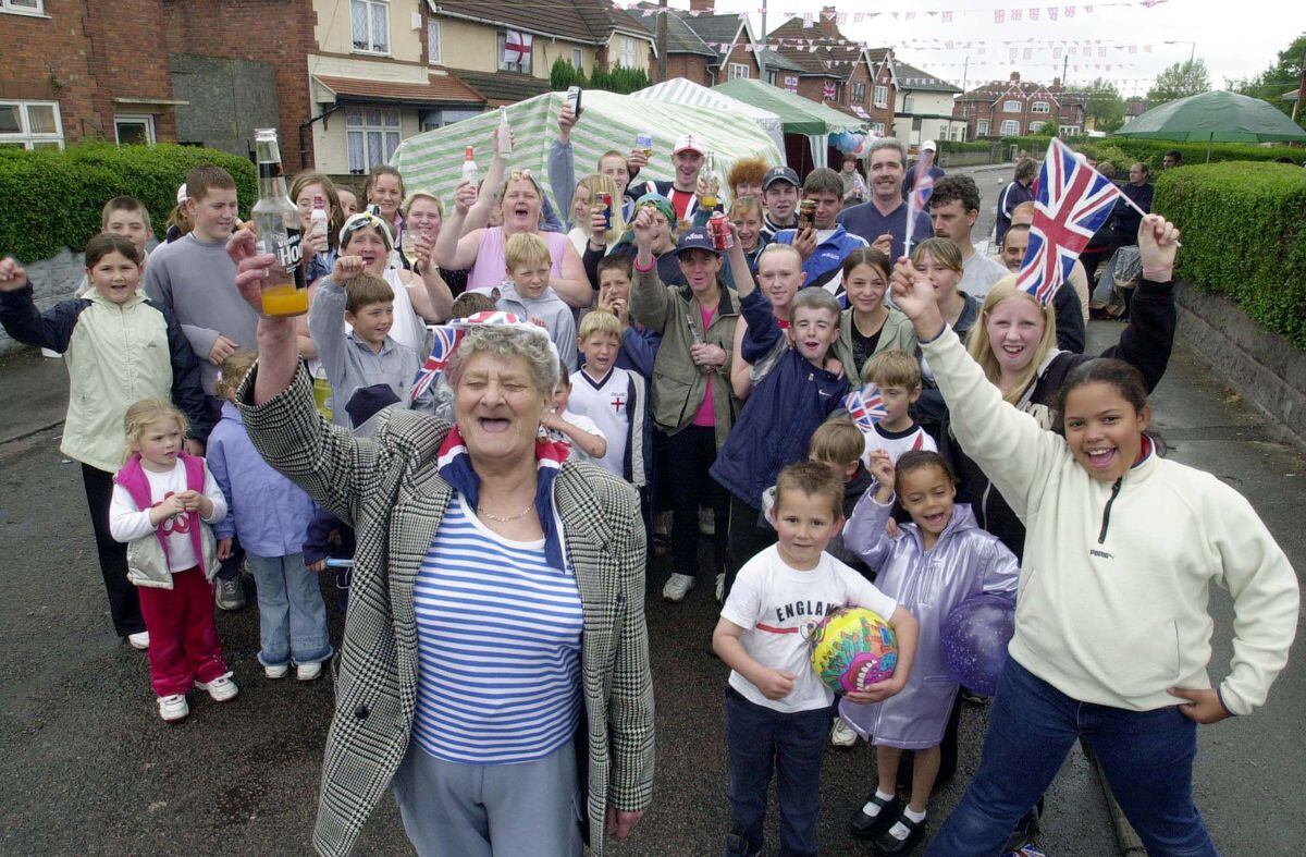 COPYRIGHT EXPRESS & STAR: PAUL TURNER:3/6/02:Mrs Brenda Morris joins with other residents from Guild Avenue, Walsall to celebrate the Queens Golden Jubilee in style with their own street party.