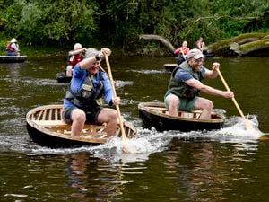 Ironbridge bank holiday Coracle Regatta Alison Milburn (left) on her to victory in the intermediate race. Photo: Dave Bagnall 