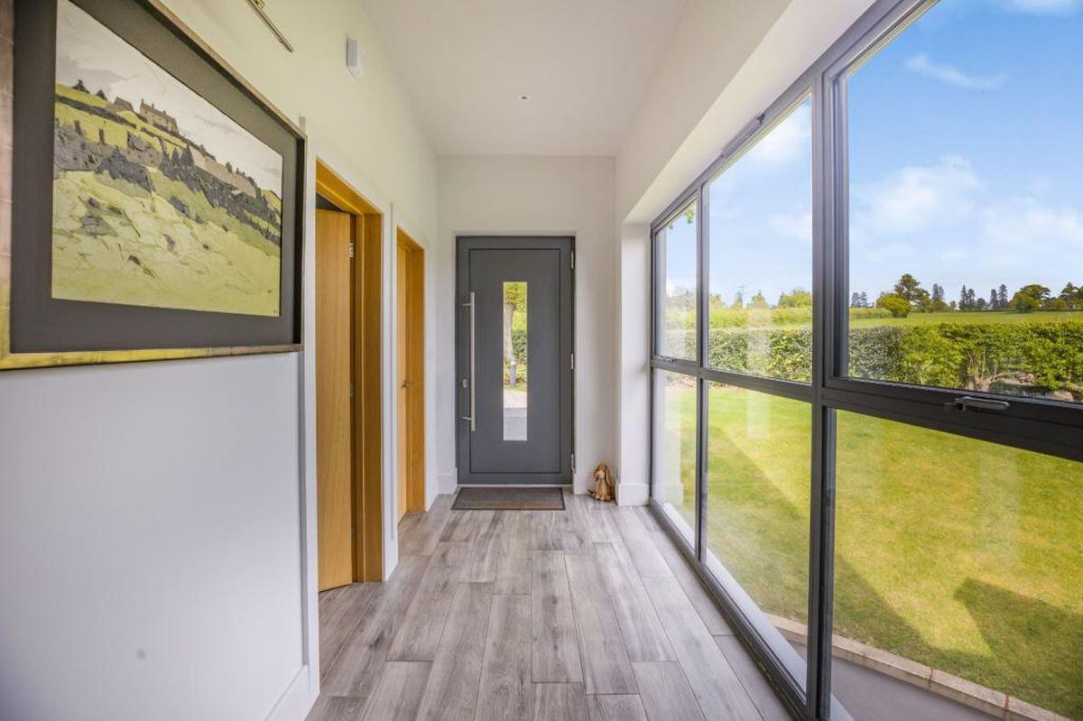 One of the hallways in the house, with large windows looking out onto the countryside. Photo: Strutt & Parker/Rightmove