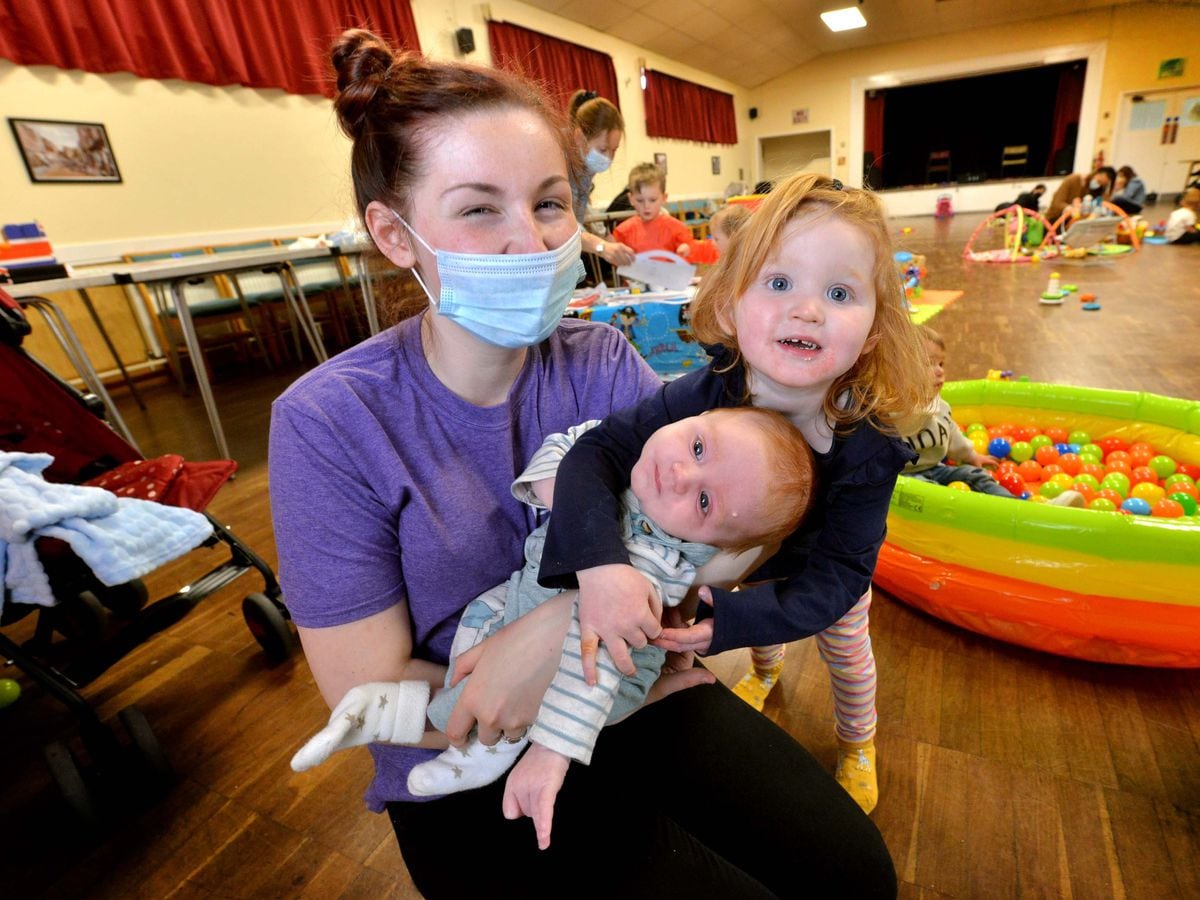 Emily Reeves, 22, with three-month-old son Charlie and daughter Rosie, two