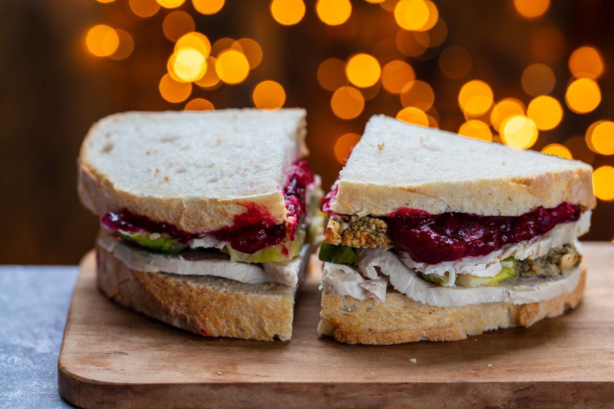 Leftovers Christmas sandwich with turkey, stuffing and cranberry sauce
