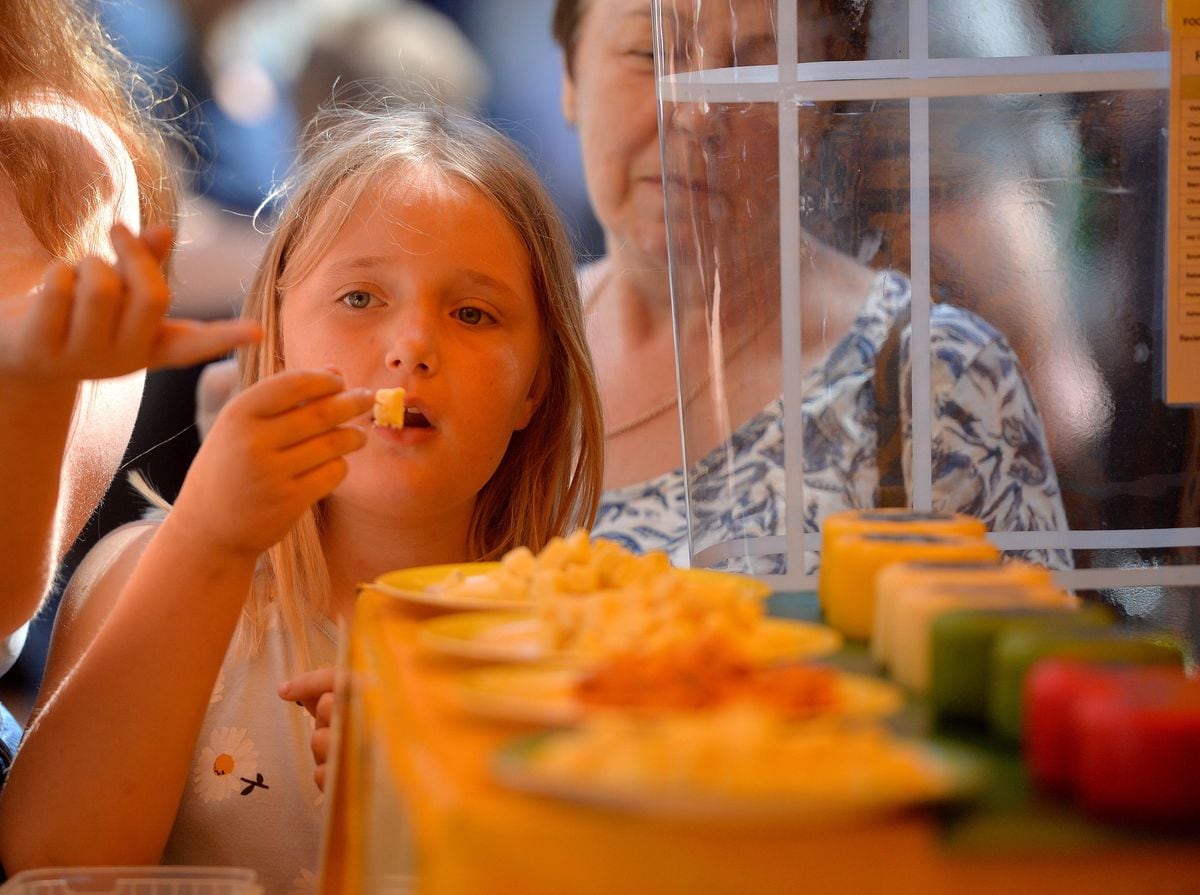Holly Jones, 8, from Cockshutt, trying out cheese