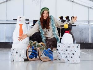 Lily Moreland gets festive at the ice skating rink 