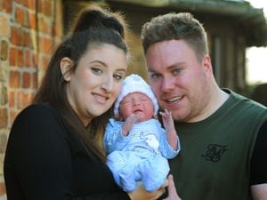 New Year’s baby Roman Gray Hulme with his proud parents Lexi Shinton and David Hulme, now back home