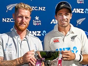 England’s captain Ben Stokes and New Zealand counterpart Tim Southee share the trophy after the drawn series