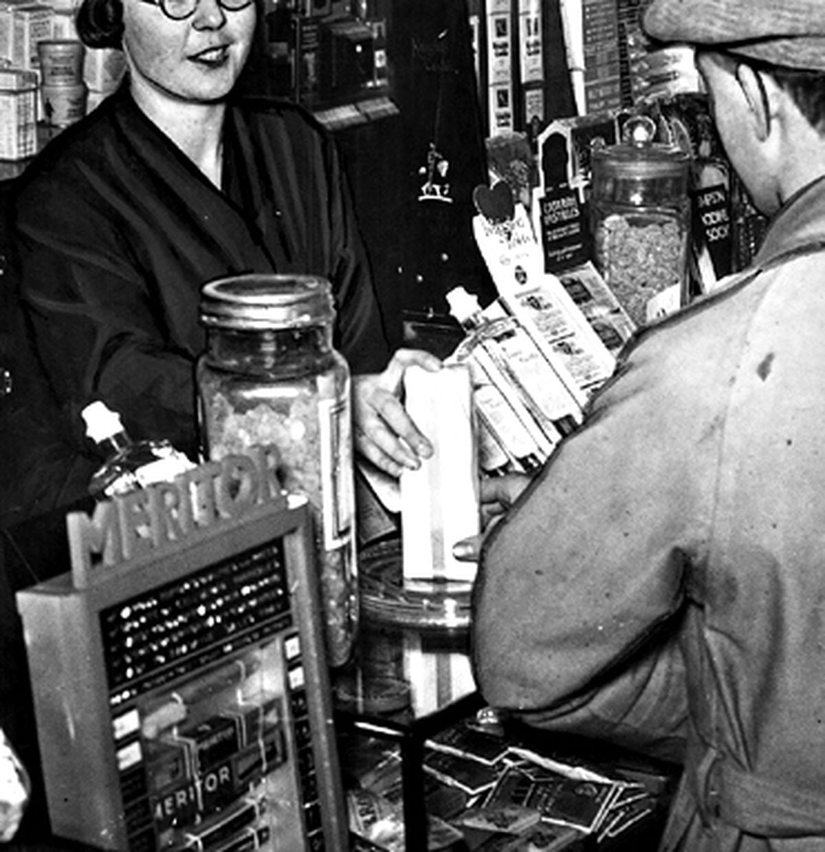 The young novelist Edith Pargeter working in Bemrose's chemists shop in Dawley in 1936 – her first book had just been published.