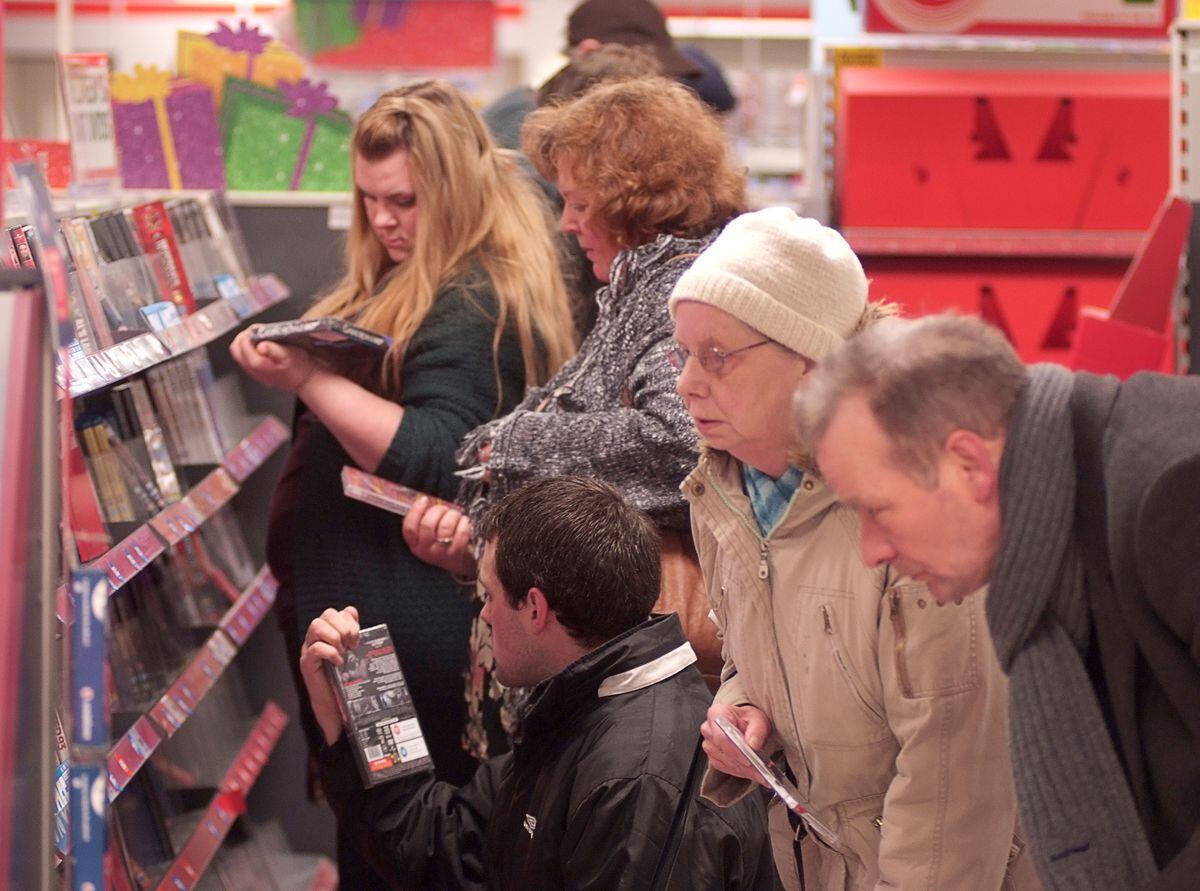 Shoppers in Woolworths in Whitchurch browsing for last minute bargains. 