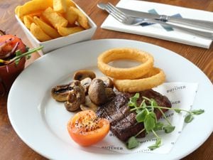 Pleased to meat you – steak was served with onion rings, chips and mushrooms                                                                                                            Pictures by Russell Davies