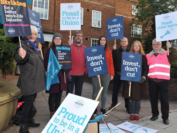 NEU workers on a previous strike outside Shrewsbury College in 2019.