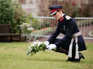 The Lord Lieutenant of Shropshire, Anna Turner, laying flowers in tribute to the Queen at Shrewsbury Castle