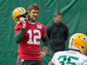 Green Bay Packers quarterback Aaron Rodgers watches a drill during NFL football practice