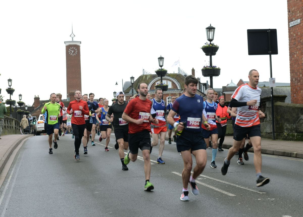 Runners crossing the Welsh Bridge as the Shrewsbury 10K run gets underway