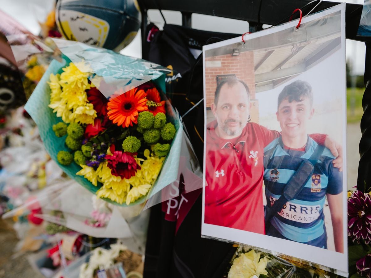 Floral tributes are attached to the gates at the Bishop's Castle rugby club in memory of Dylan Price