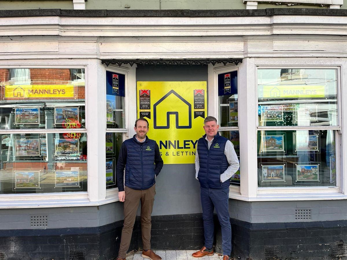 Directors of Mannleys Estate Agents Chris Mann and Aaron Manley outside the building now owned by the firm in Market Street, Wellington.