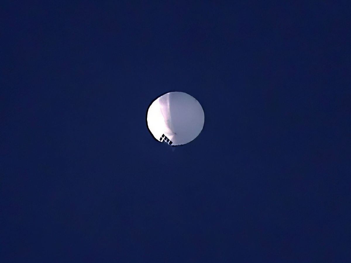 A high altitude balloon floats over Billings, Mont., on Wednesday, Feb. 1, 2023