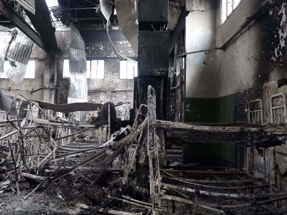 In this photo taken from video a view of destroyed barrack at a prison in Olenivka, in an area controlled by Russian-backed separatist forces, eastern Ukraine, Friday, July 29, 2022