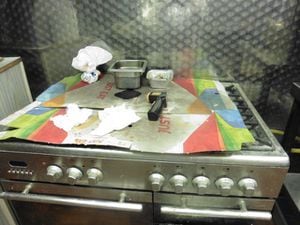 Dirty, cardboard-covered work surfaces at Momma's Pizzas in Oakengates. Photo: Telford & Wrekin Council