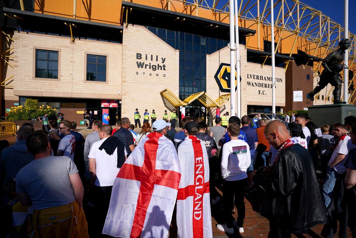 England fans arrive ahead of the UEFA Nations League match at the Molineux Stadium, Wolverhampton. Picture date: Tuesday June 14, 2022..