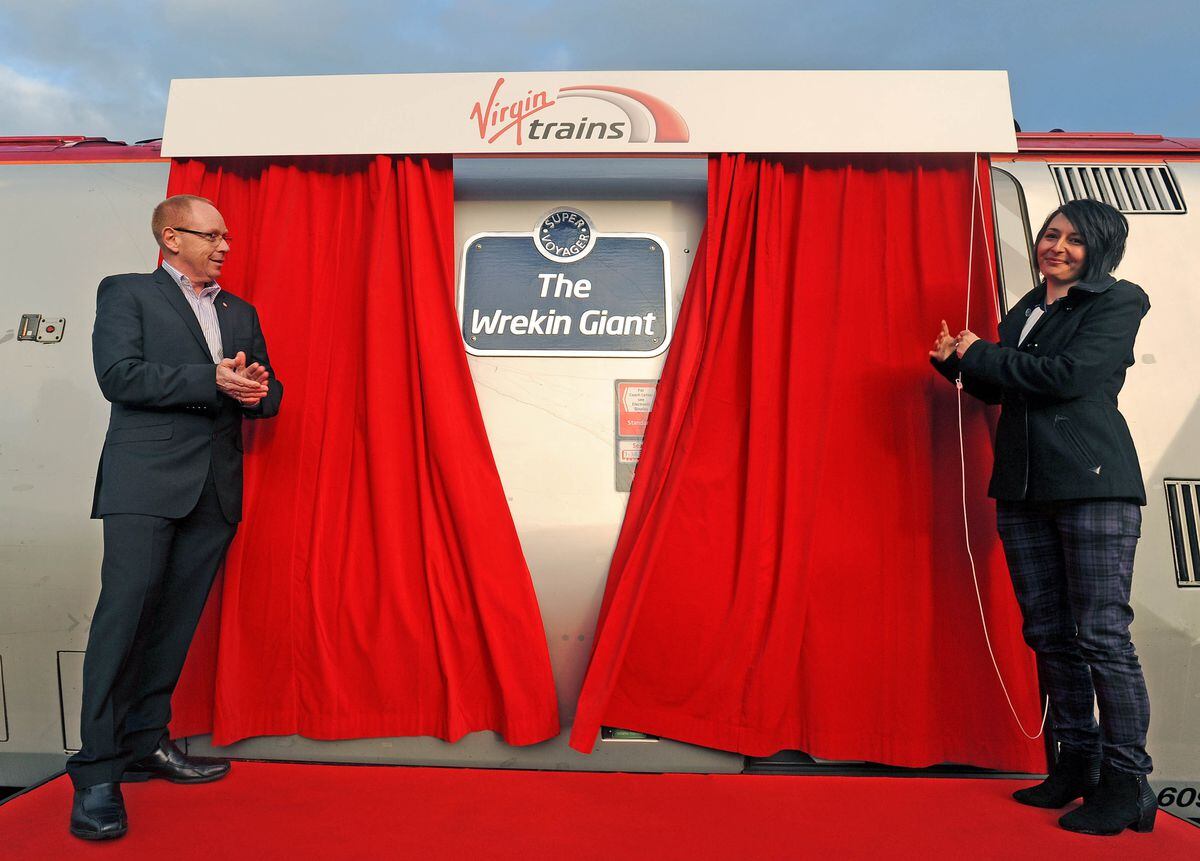 Shropshire Star competition winner Toni Williams from Telford officially names a Virgin train The Wrekin Giant at Shrewsbury Train Station. She is joined by Phil Bearpark, Executive Director of Operations and Projects at Virgin.