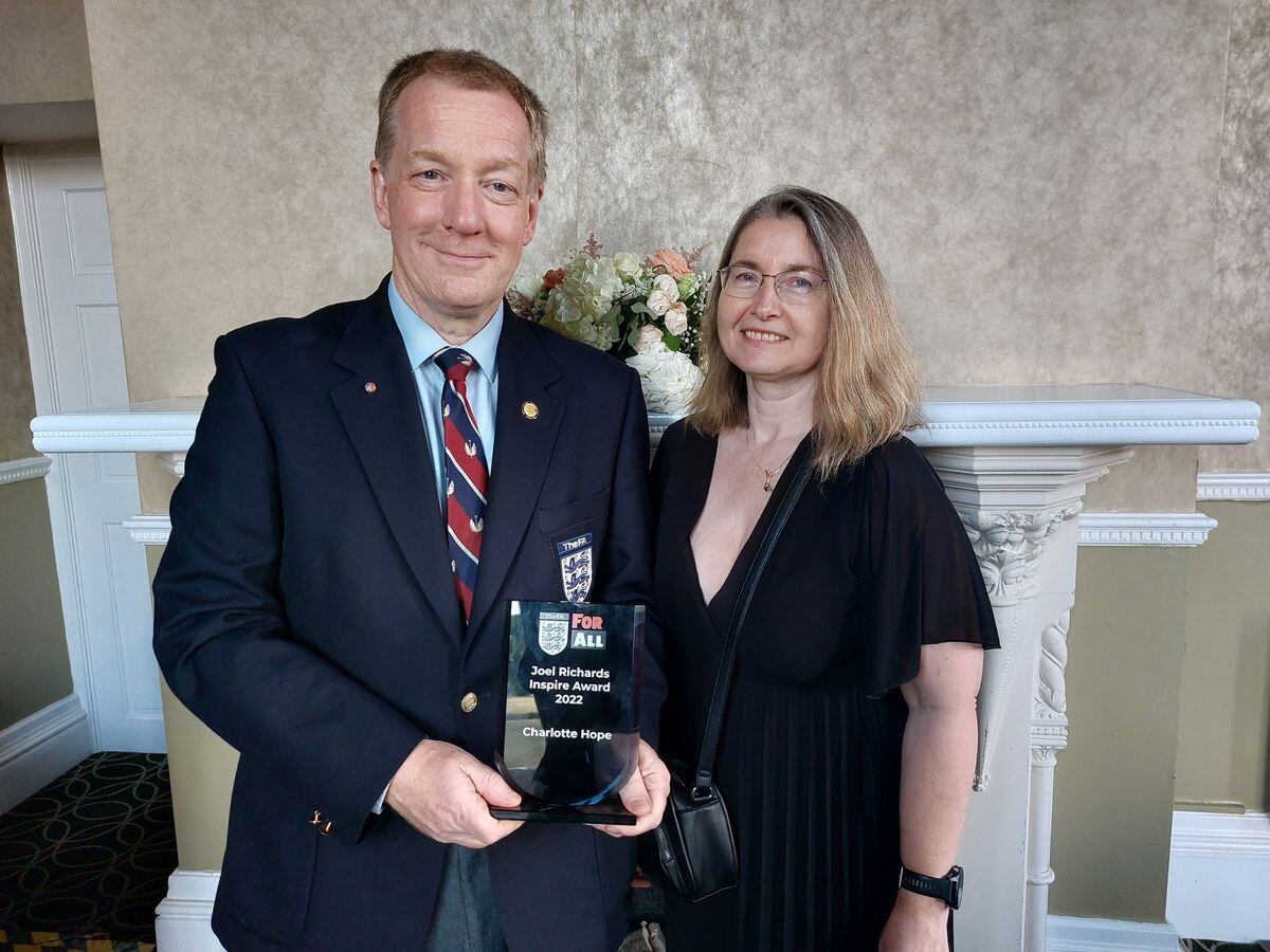 Wing Commander Neil Hope and his wife Helen, with the award presented in memory of their daughter, Charlotte.