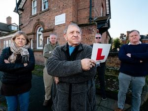 Lucy Lawrence, Derek Turner, Ron Ingall, Mark Lloyd and Alistair Stevens protest outside Whitchurch Driving Test Centre