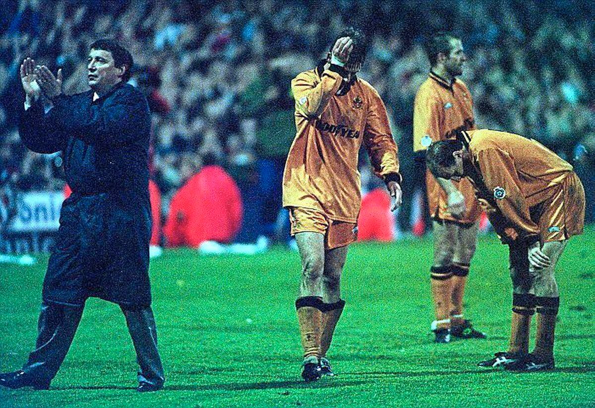 Graham Taylor applauds the Wolves fans at Burnden Park alongside a dejected David Kelly, Steve Bull and Gordan Cowans following the heartbreaking play-off semi-final defeat to Bolton