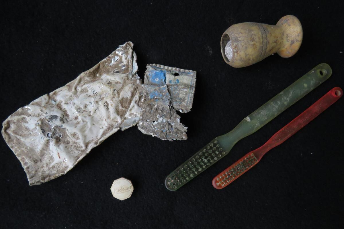 Toothbrushes and other personal items found at the camp. Photo: Wessex Archaeology