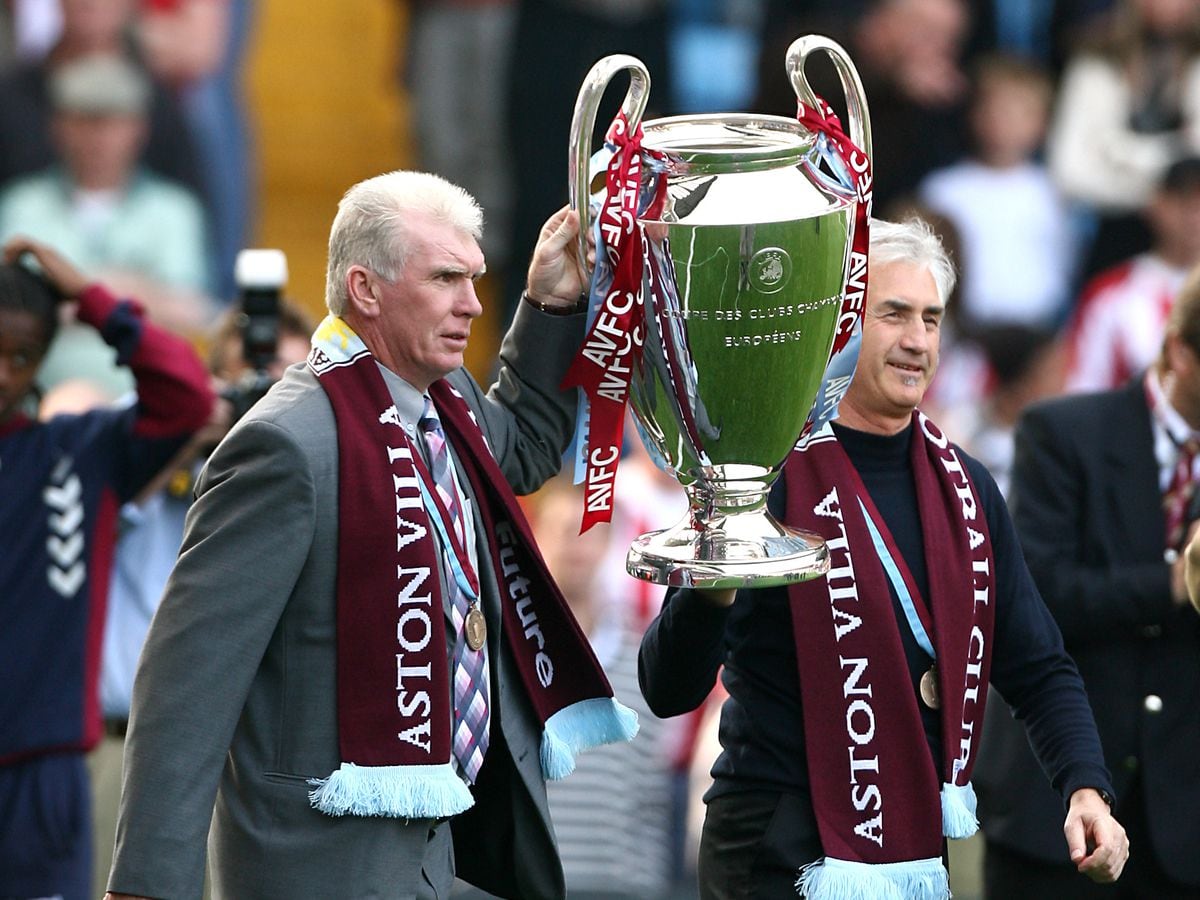 Former Aston Villa players Peter Withe (left) and Dennis Mortimer with the European Cup which his side won in 1982.