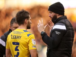 Luke Leahy of Shrewsbury Town receives instructions from Assistant Manager Aaron Wilbraham (AMA)