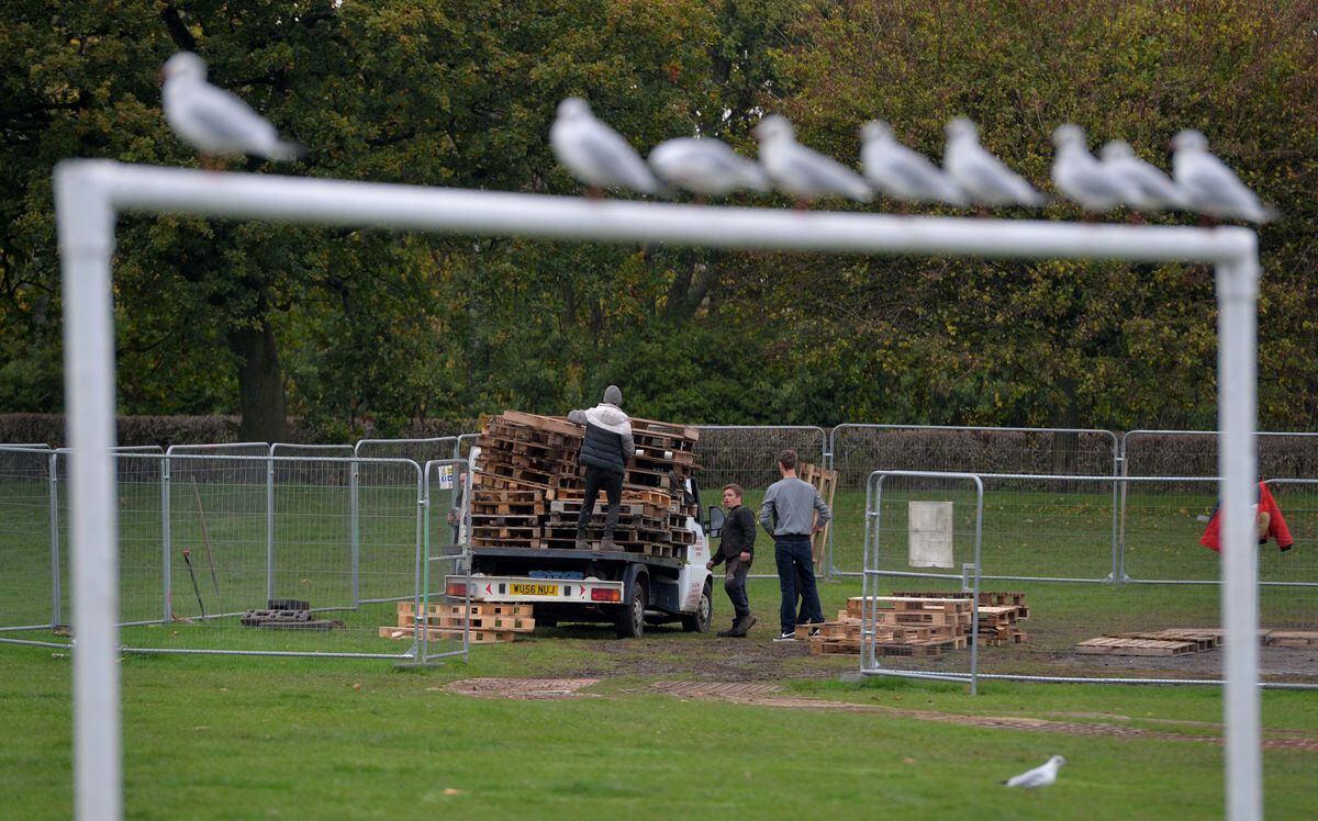 The rebuilding of the bonfire has started