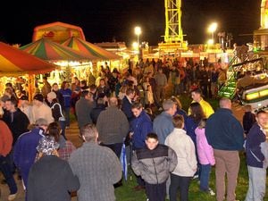 All looks calm – but there are about to be fireworks. These folk were enjoying the funfair at Weston Park 20 years ago, that is, November 2001, which was being held as part of a big fireworks display.