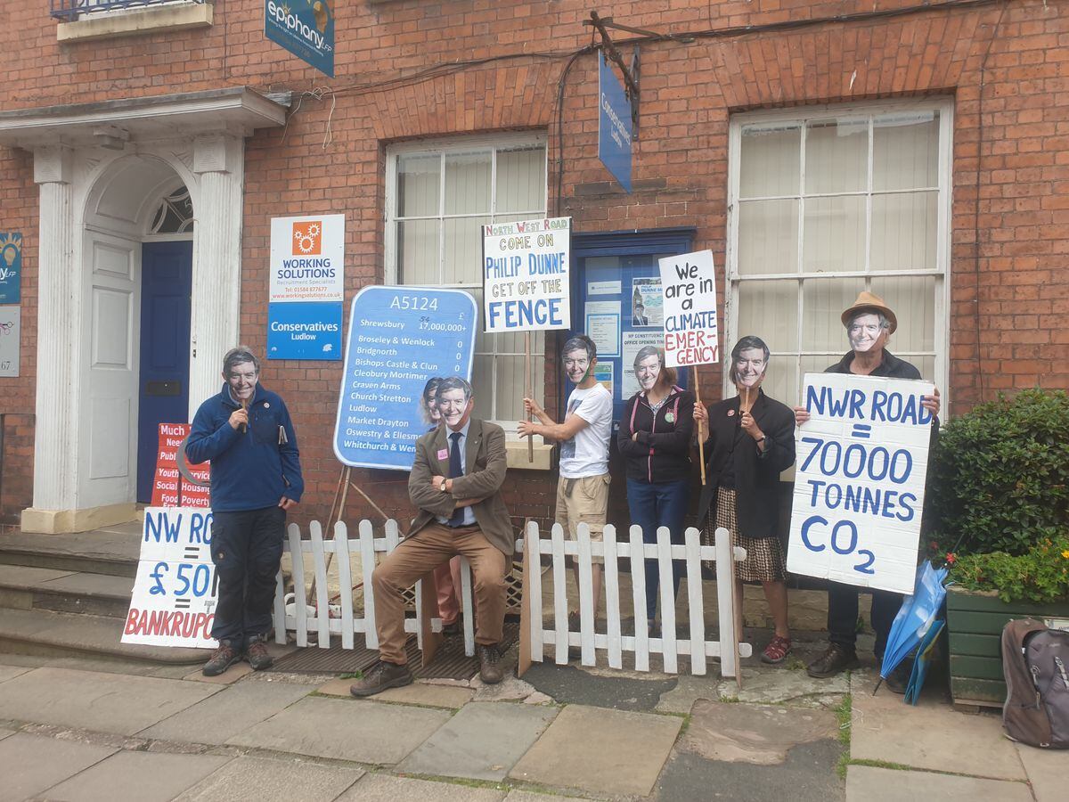 Protesters outside Ludlow MP Philip Dunne's constituency office where they called on him to oppose plans for Shrewsbury's North West Relief Road