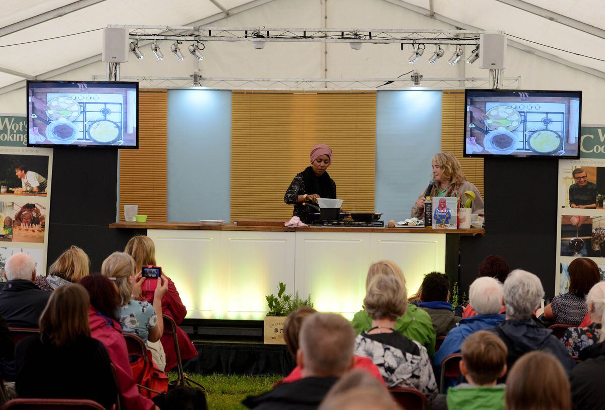 Special guest Nadiya Hussain showing off her cooking skills at Newport Show in 2016