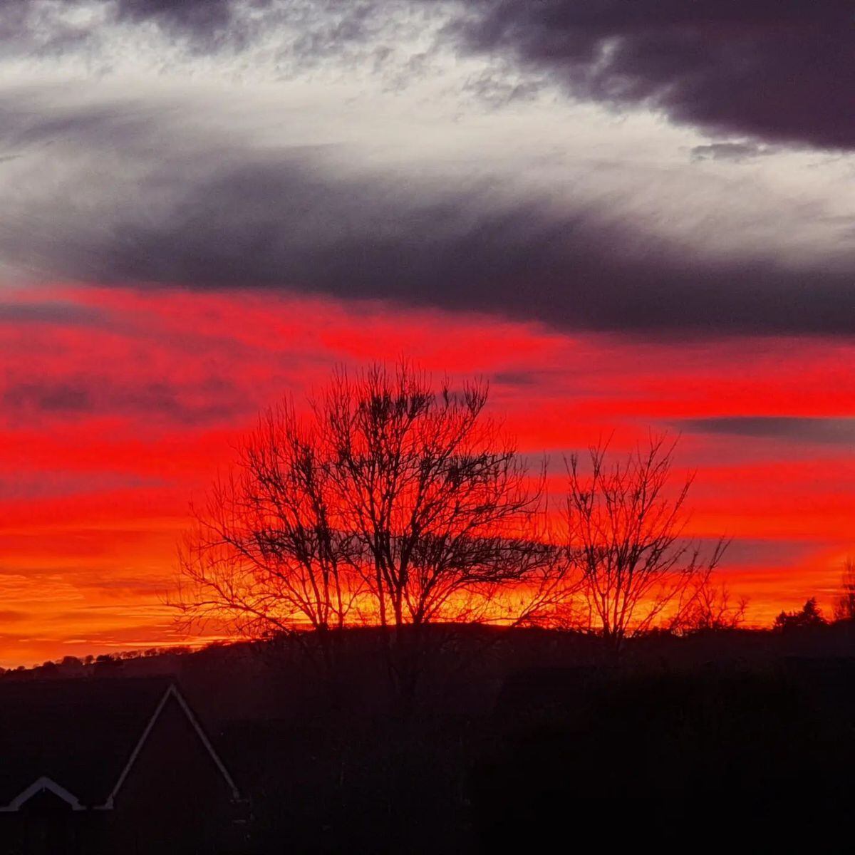 Deep red over Oswestry, photographed by Phil Parry