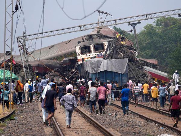 Rescuers work at the site of passenger trains that derailed in Balasore district, in the eastern Indian state of Orissa, Saturday, June 3, 2023. Rescuers are wading through piles of debris and wreckage to pull out bodies and free people after two passenger trains derailed in India, killing more than 280 people and injuring hundreds as rail cars were flipped over and mangled in one of the country’s deadliest train crashes in decades