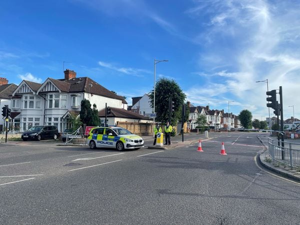 A police cordon in Cranbrook Road, Ilford, where a murder investigation is under way following the death of a 36-year-old woman
