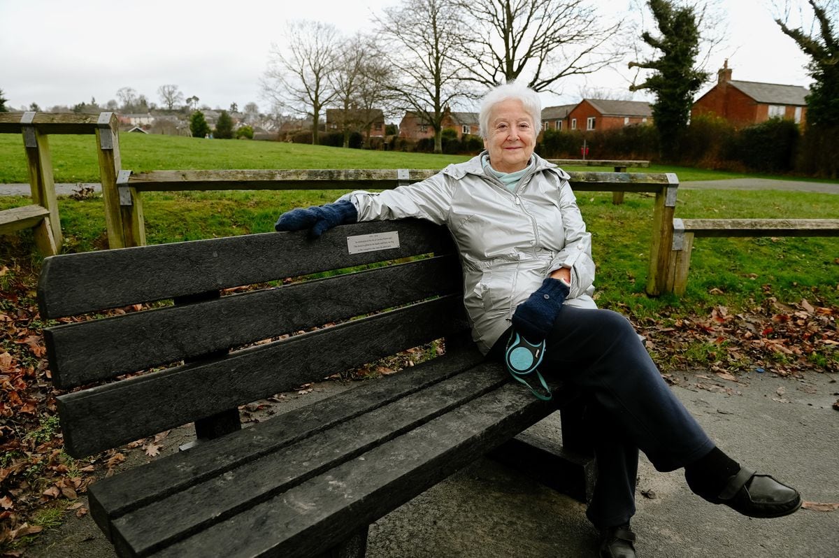 Pat Wainwright with the memorial bench installed for her husband Gordon
