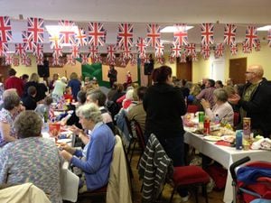 A file picture of previous Jubilee celebrations at Onibury Village Hall, near Craven Arms, with the judging of a fancy dress competition in the background.