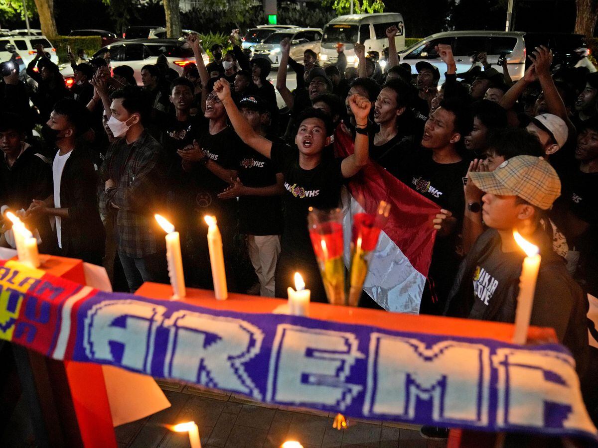 Football fans at a candle-lit vigil in Jakarta, Indonesia, for Arema FC Supporters who became victims of Saturday’s tragedy