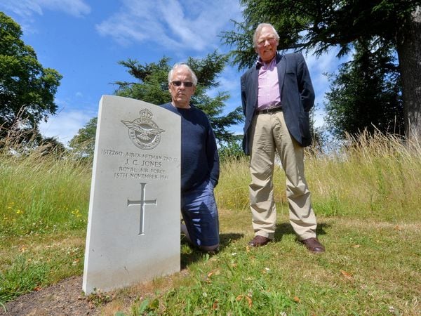 Peter Easton of the War Graves Commission and retired Lieutenant Colonel Ian Sawyers at the grave of John Charles Jones